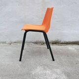 Orange plastic shell chair