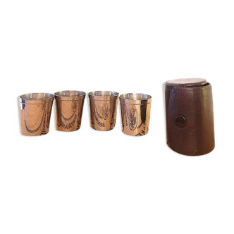 Liquor service in its leather case