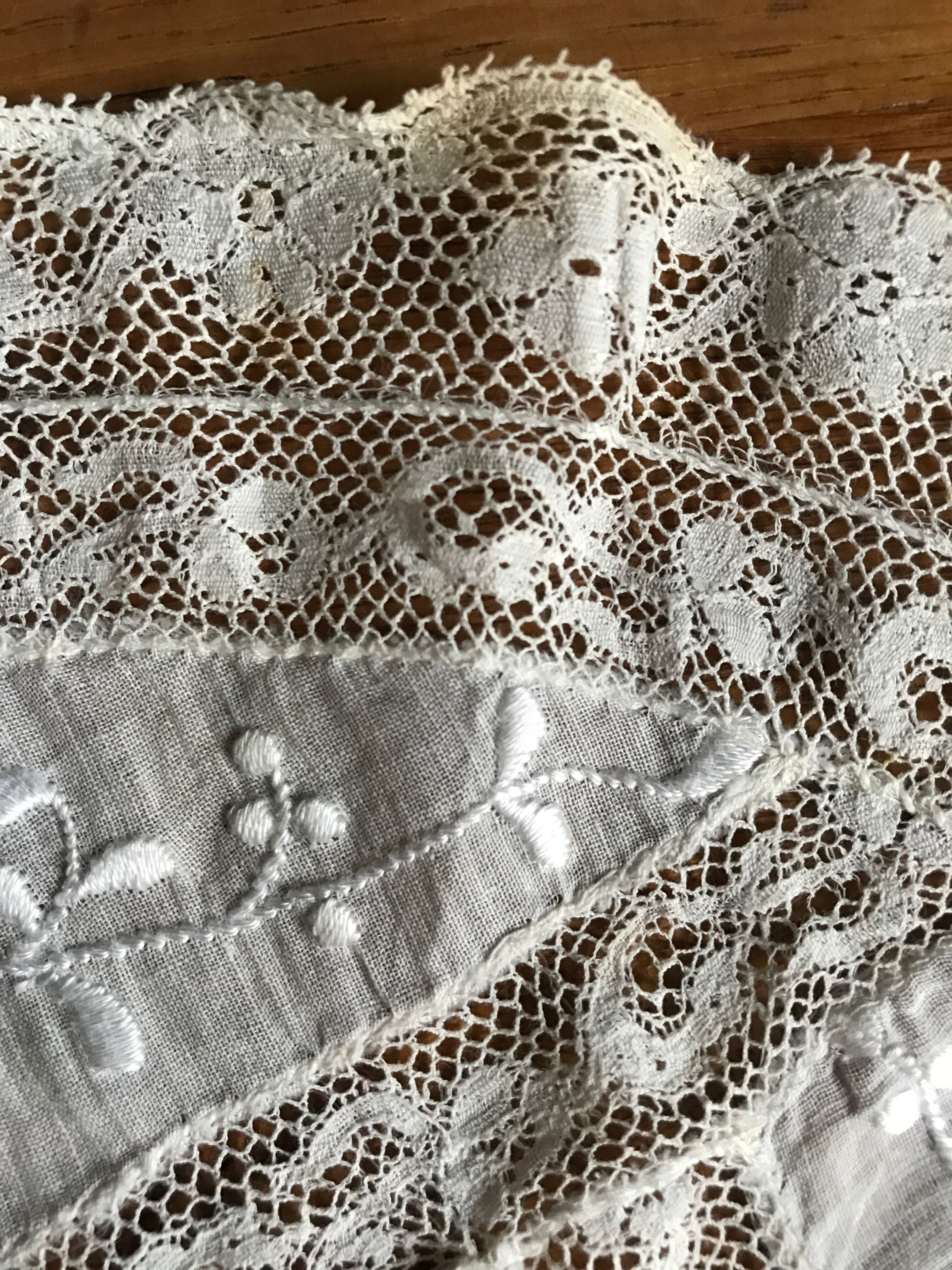 Embroidered lace cover