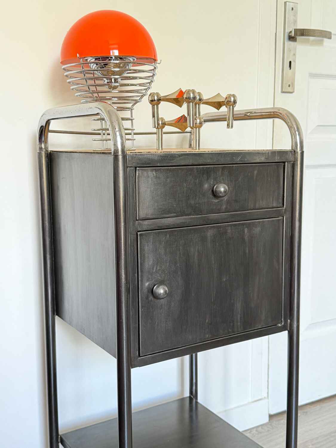 Vintage bedside table in brushed metal