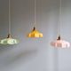 Trio of Art Deco pendant lights in colored opaline glass, 1930s