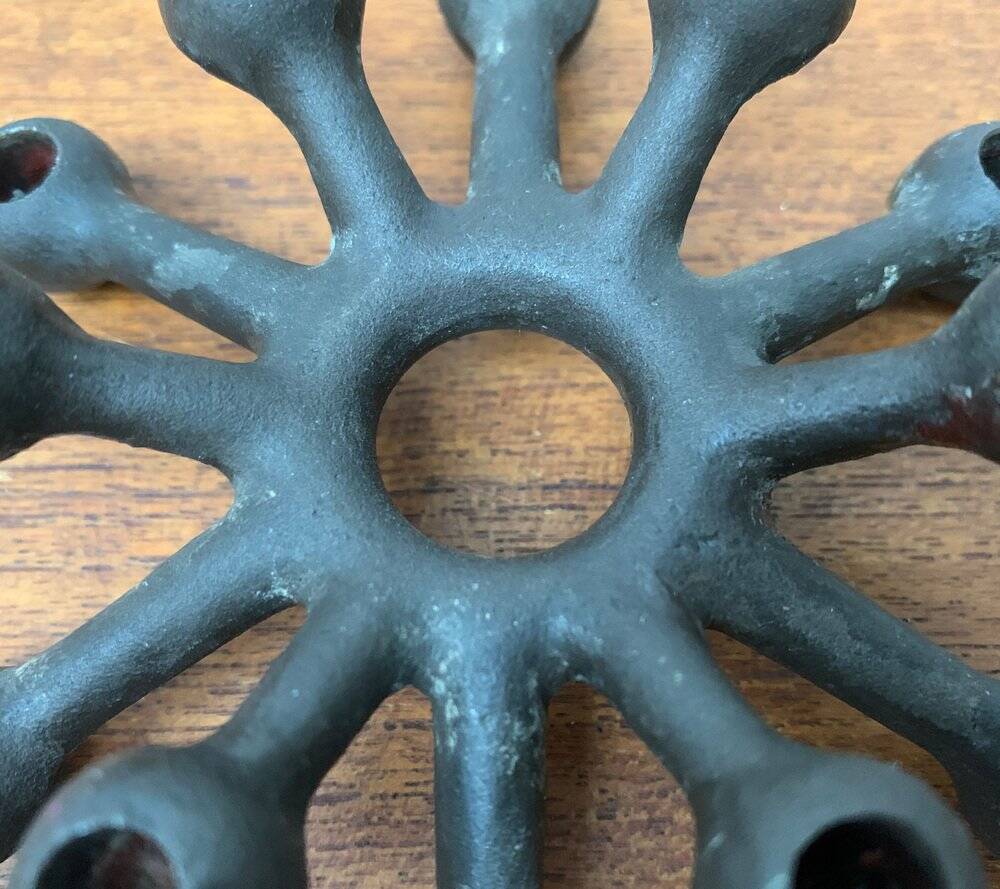 Brutalist Danish candle holder from the mid-century in cast iron by Jens H. Quistgaard.