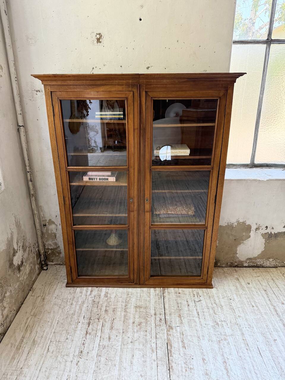 Glass-fronted walnut library 1900