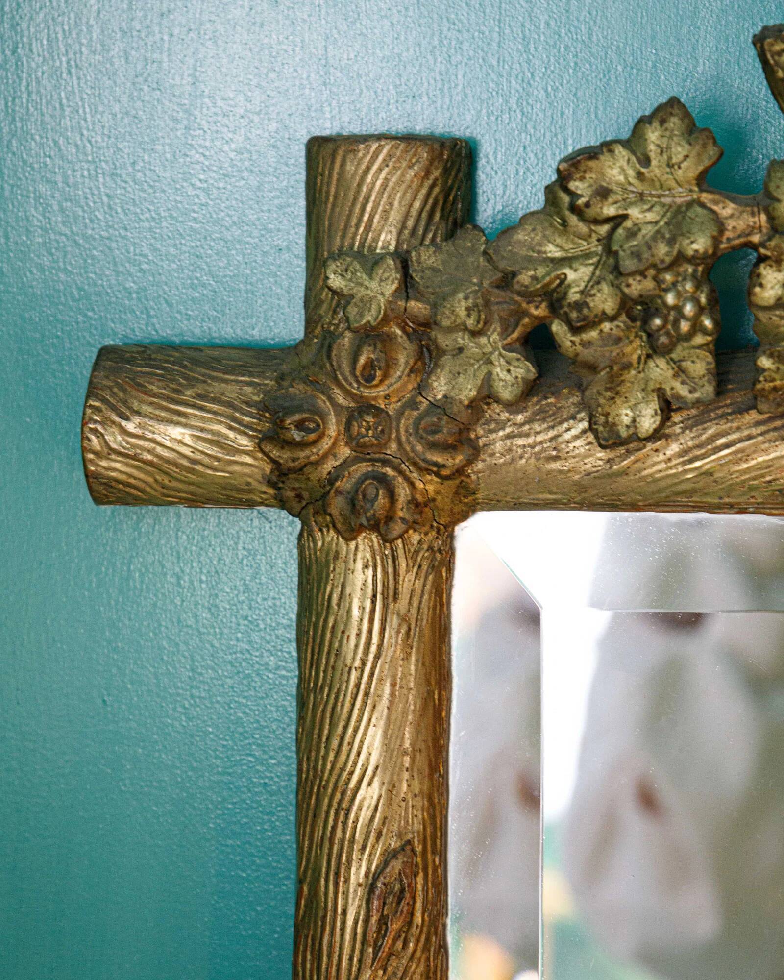 Antique faux wood mirror with bird's nest, 19th century