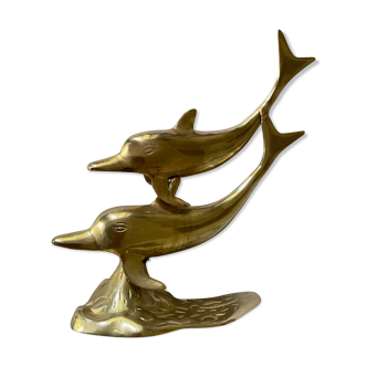 Golden brass dolphins