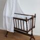 Old Vintage cradle with balance on wheels
