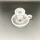 Candle holder with cup and handle in worked glass