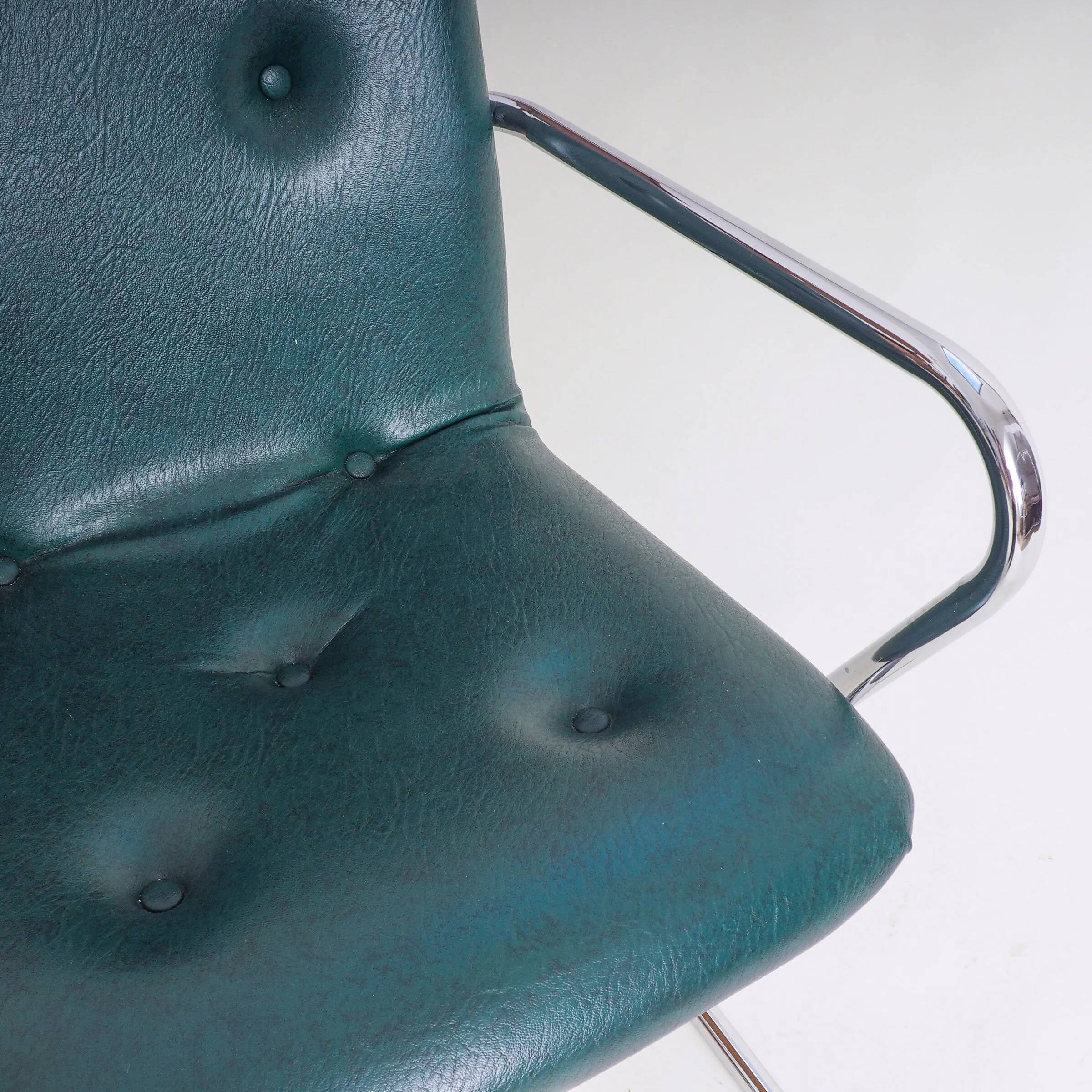 70s tubular arm chair by Tavo