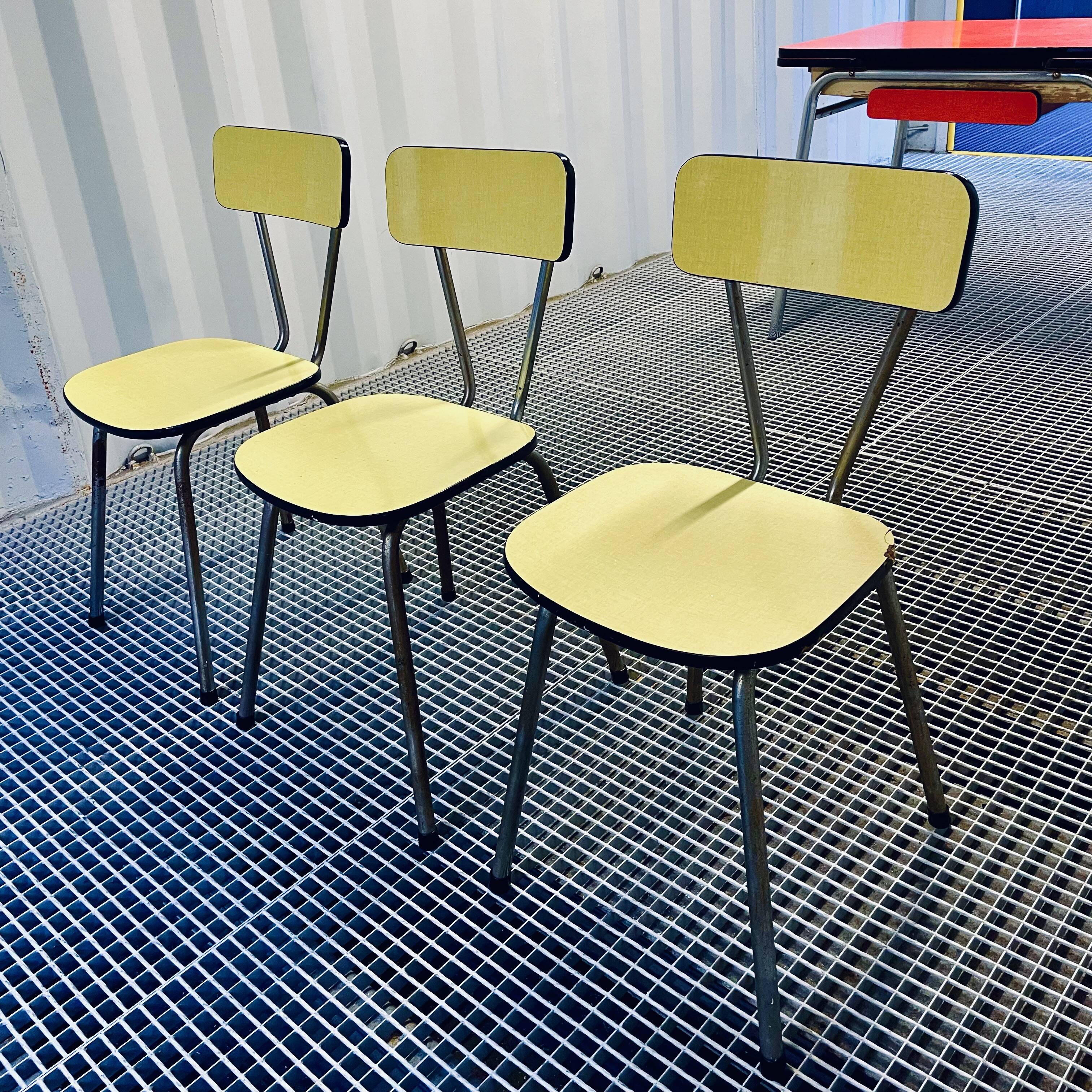 Red Formica table and vintage yellow chairs