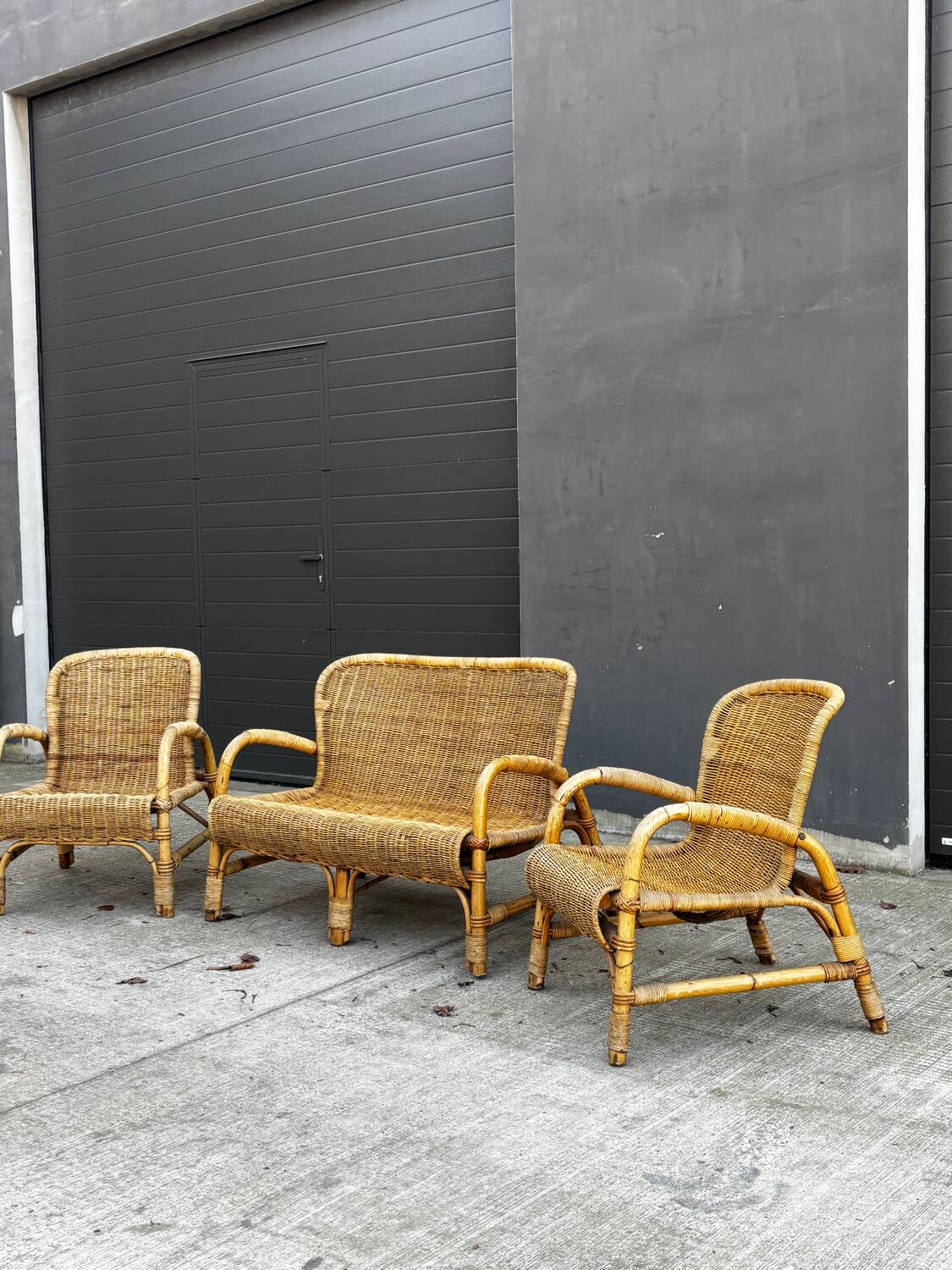 Vintage rattan garden furniture – complete set with sofa and armchairs.