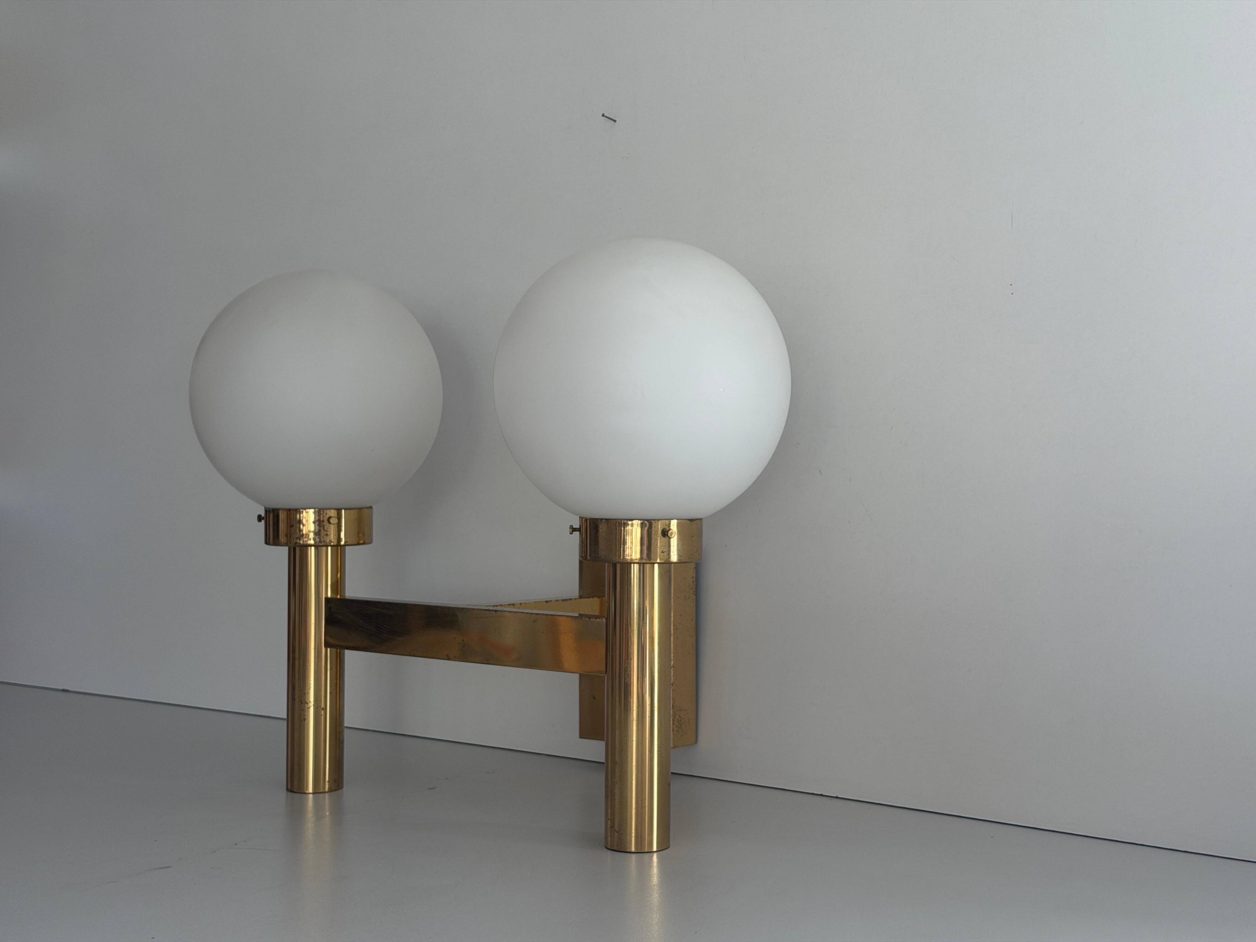 Double opal glass and heavy brass, large minimalist cinema wall light, 1960s, Germany