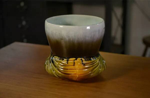 Numbered polychrome art nouveau ceramic planter, early 20th century