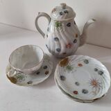 coffee pot, cup and saucers