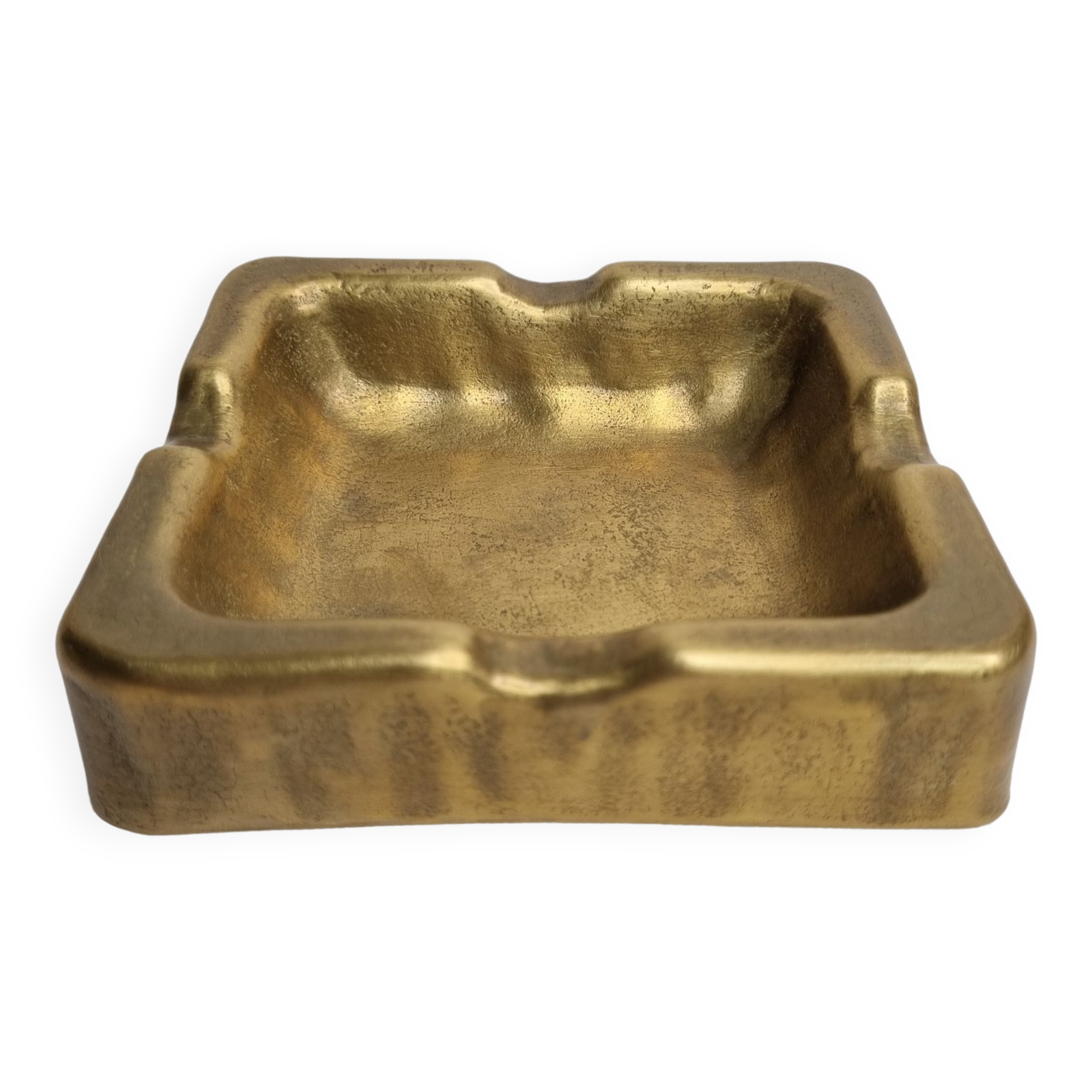 Empty pocket brutalist-inspired ashtray in gilded bronze