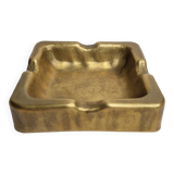 Empty pocket brutalist-inspired ashtray in gilded bronze