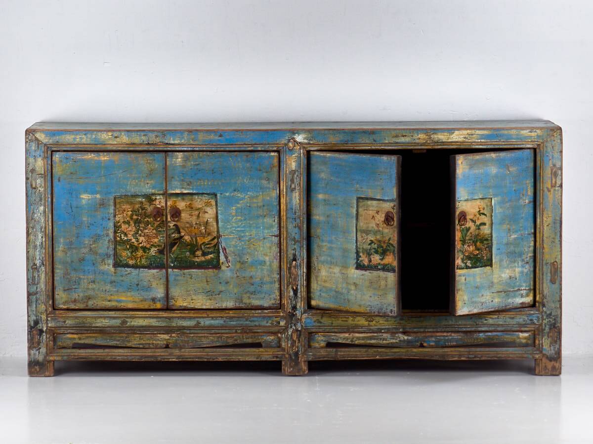 Old wooden entrance buffet in blue and yellow tones (circa 1920).