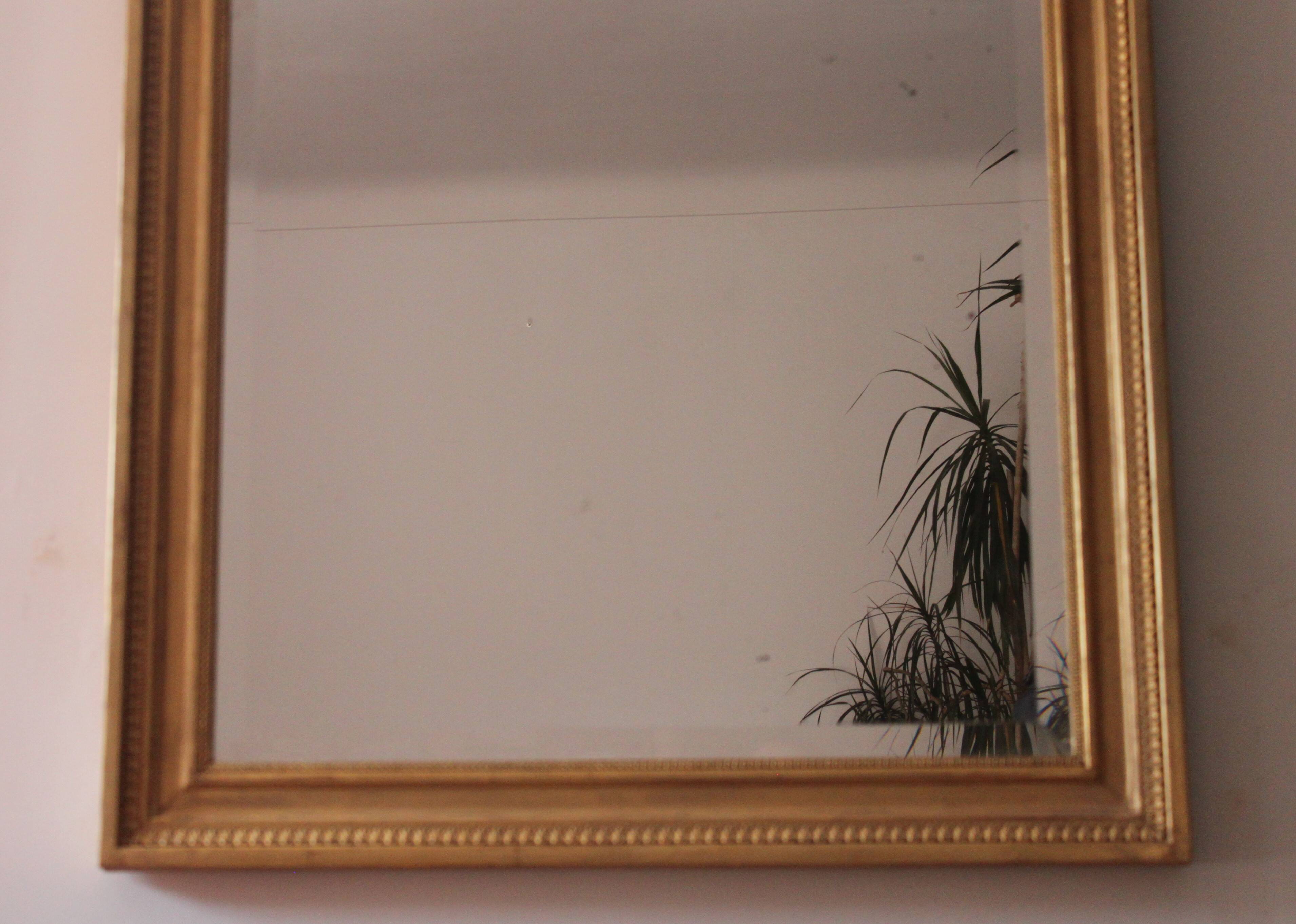 Large bevelled gold mirror