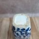 Small antique vase in blue and white earthenware, hand-painted – oriental decoration.