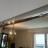 Large vintage Hollywood Regency style mirror with shutters.