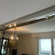 Large vintage Hollywood Regency style mirror with shutters.