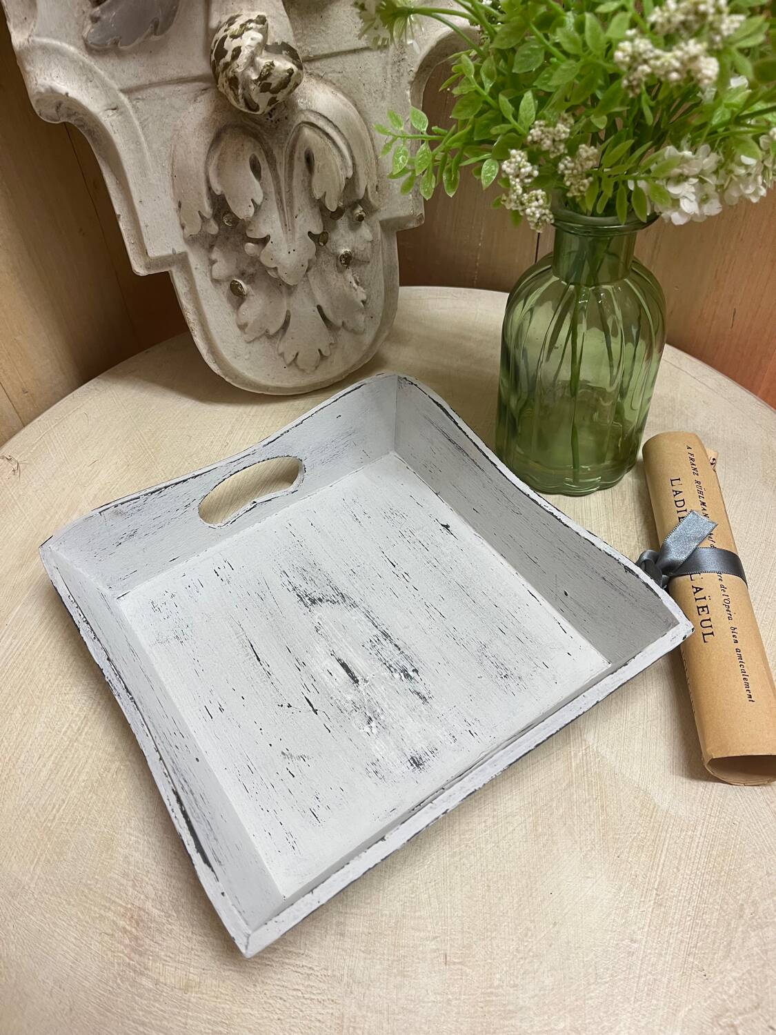 Old wooden tray with aged white patina