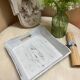 Old wooden tray with aged white patina