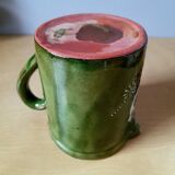 Ceramic bird pitcher.