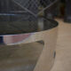 Table basse design en métal chromé et verre fumé 1970
