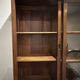 Large double-body showcase library in solid teak.