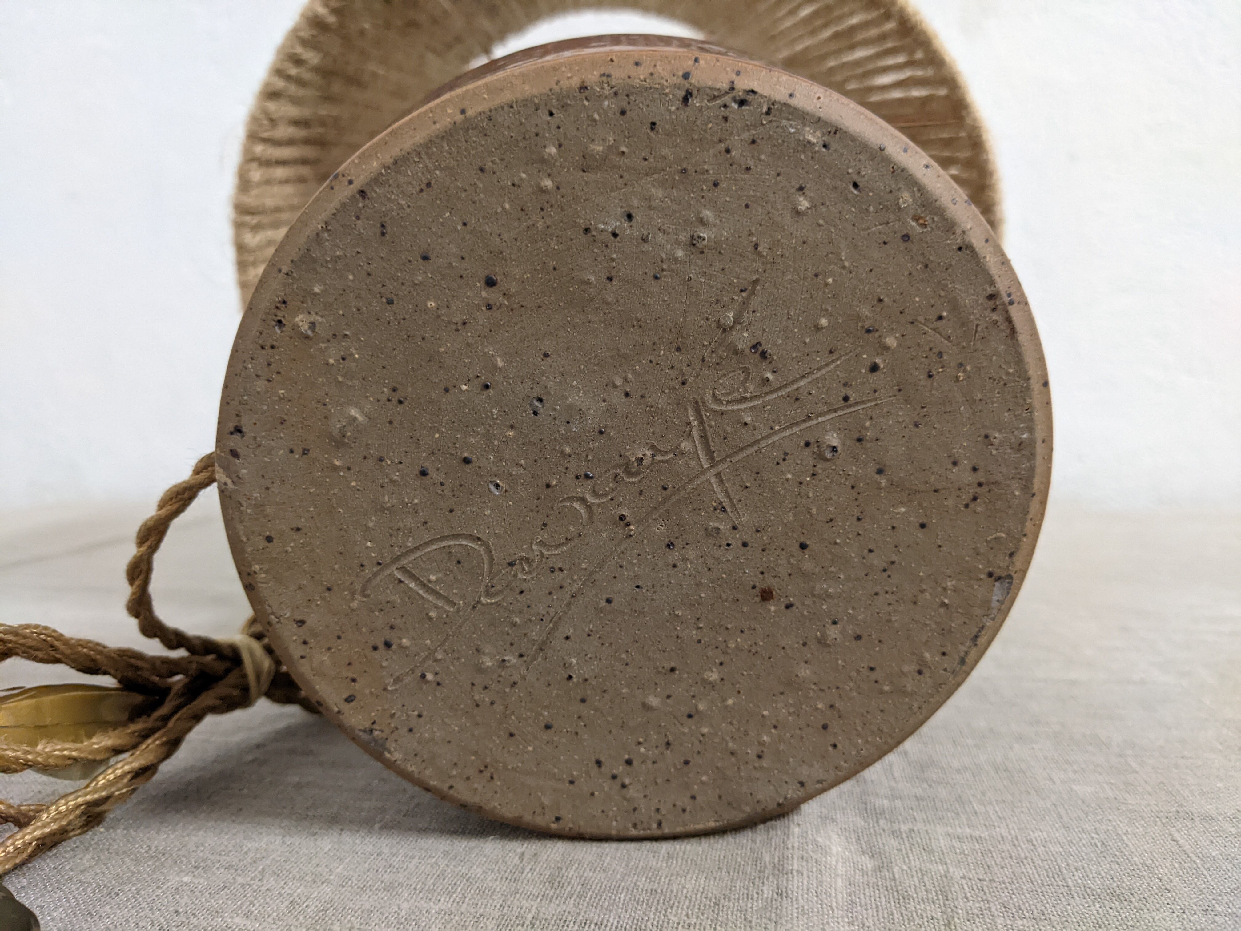 Vintage varnished stoneware lamp and jute rope