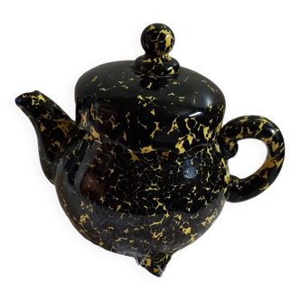 Black and yellow speckled teapot