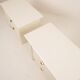 Pair of cream lacquered bedside tables by Pierre Cardin, 1980
