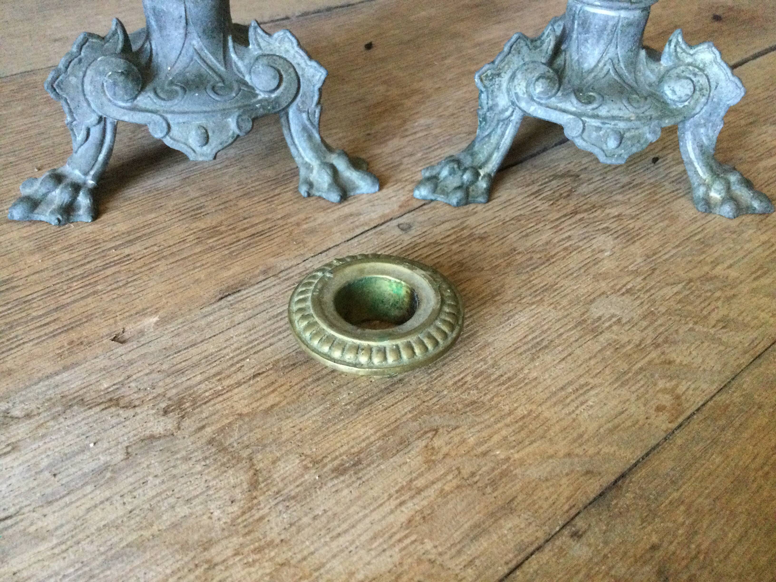Set of 2 antique candlesticks in spelter.