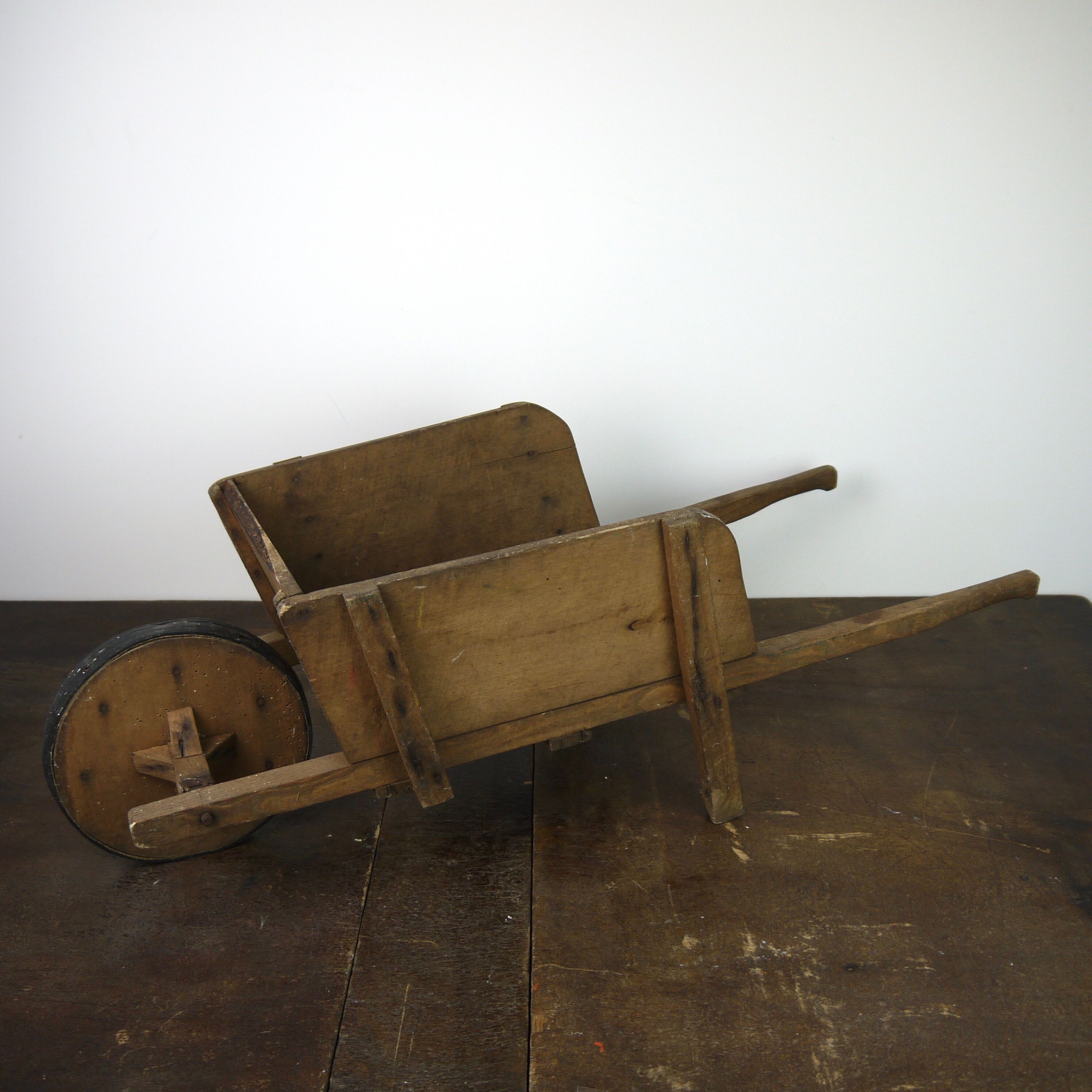 Children's wooden wheelbarrow