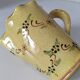 JP Daniel handmade earthenware pitcher – floral decoration on a yellow background