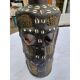African statue of a woman, made of wood, brass, beads, and seashells.