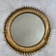 Round sun mirror in wrought iron from the 1950s Italy.
