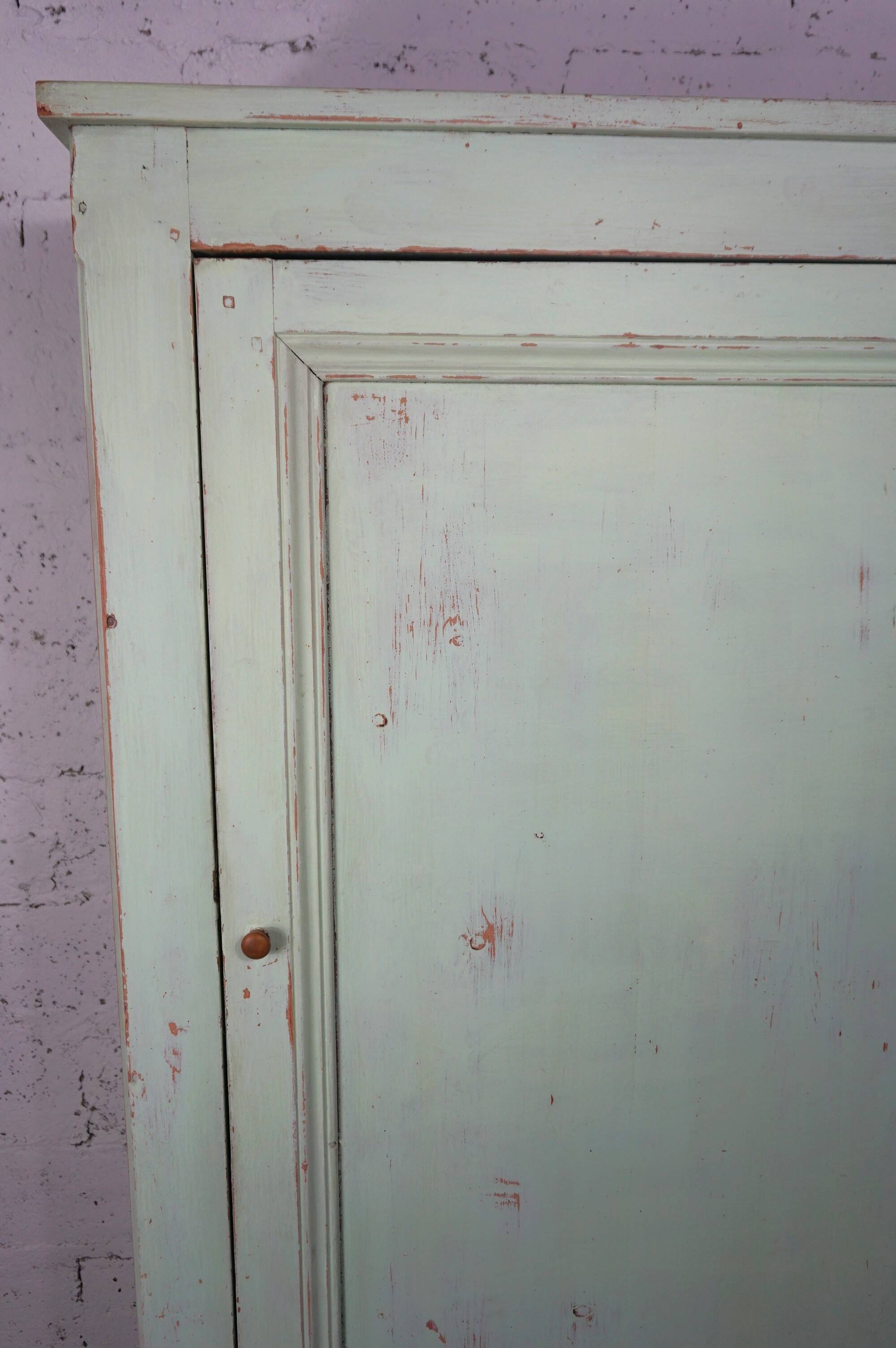 Pale green pantry cupboard