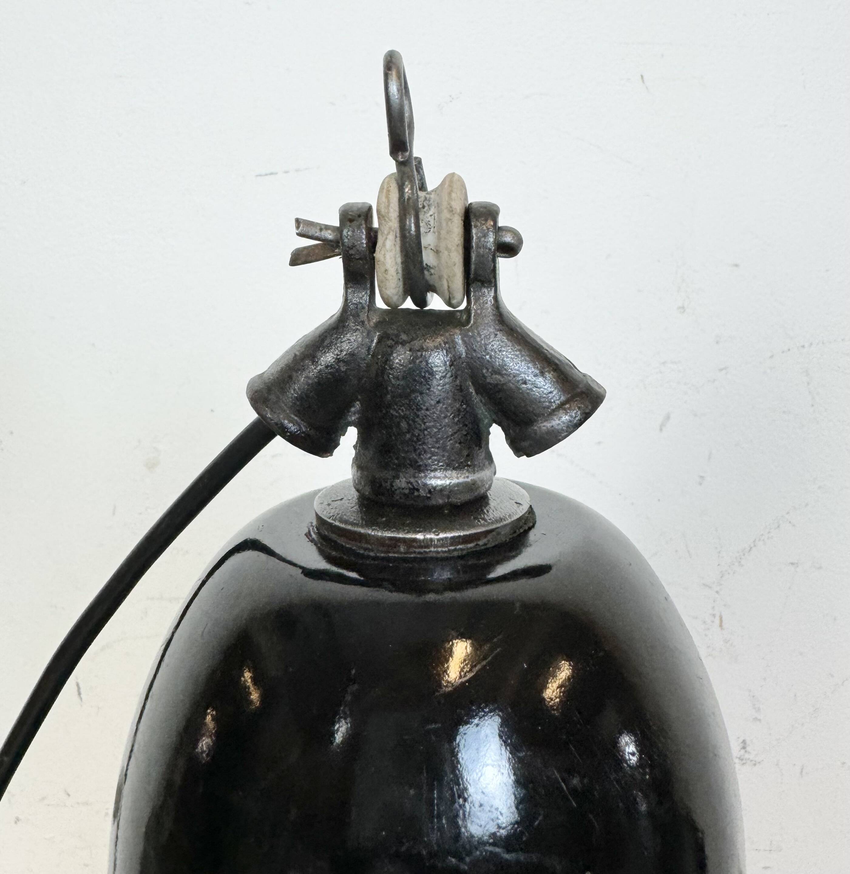 Industrial Black Enamel Factory Lamp with Cast Iron Top, 1930s