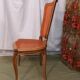 Caned chair in Louis XV style painted orange.