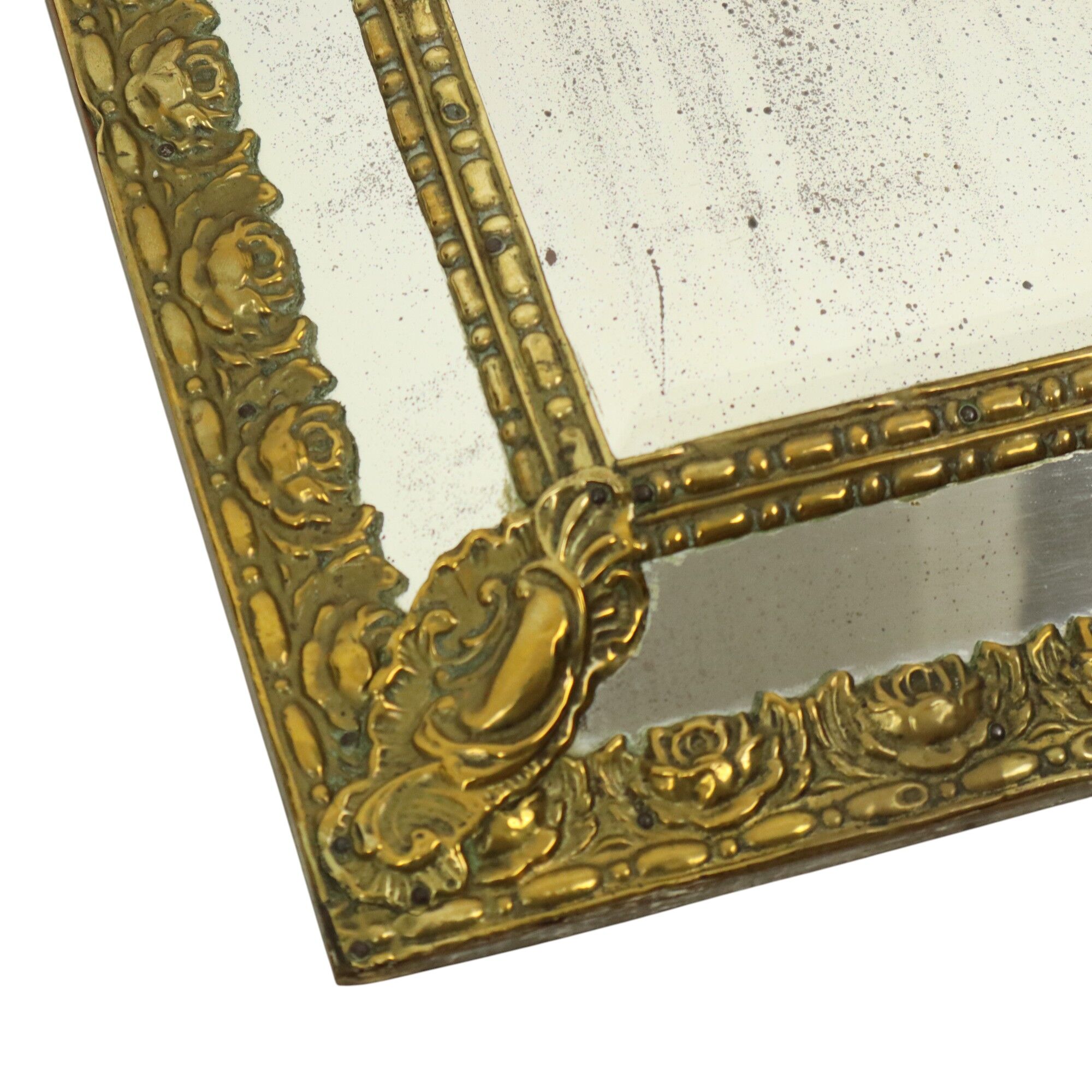 Ancien miroir à coussin repoussé facetté France