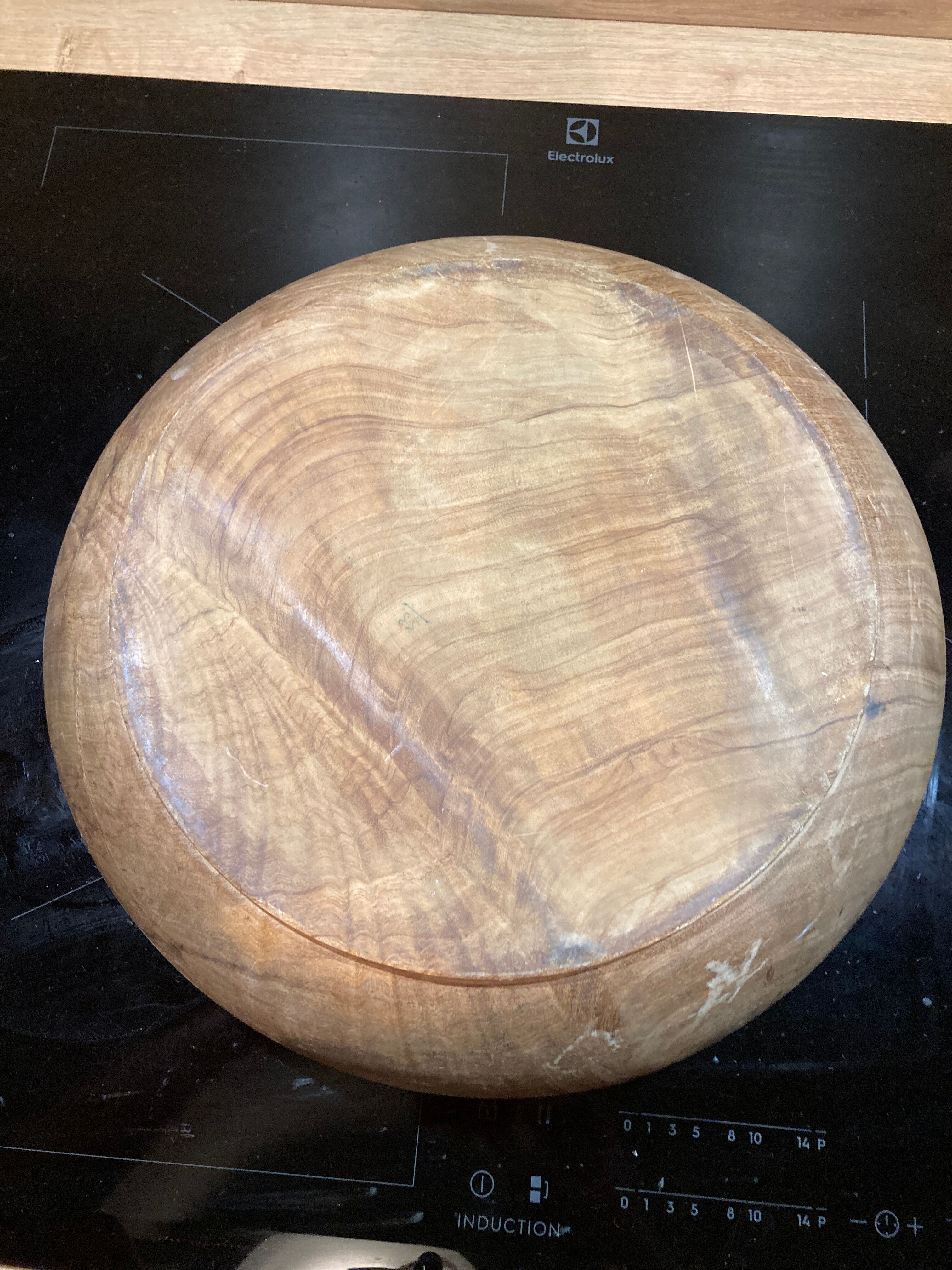 Round dish in olive tree