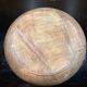 Round dish in olive tree