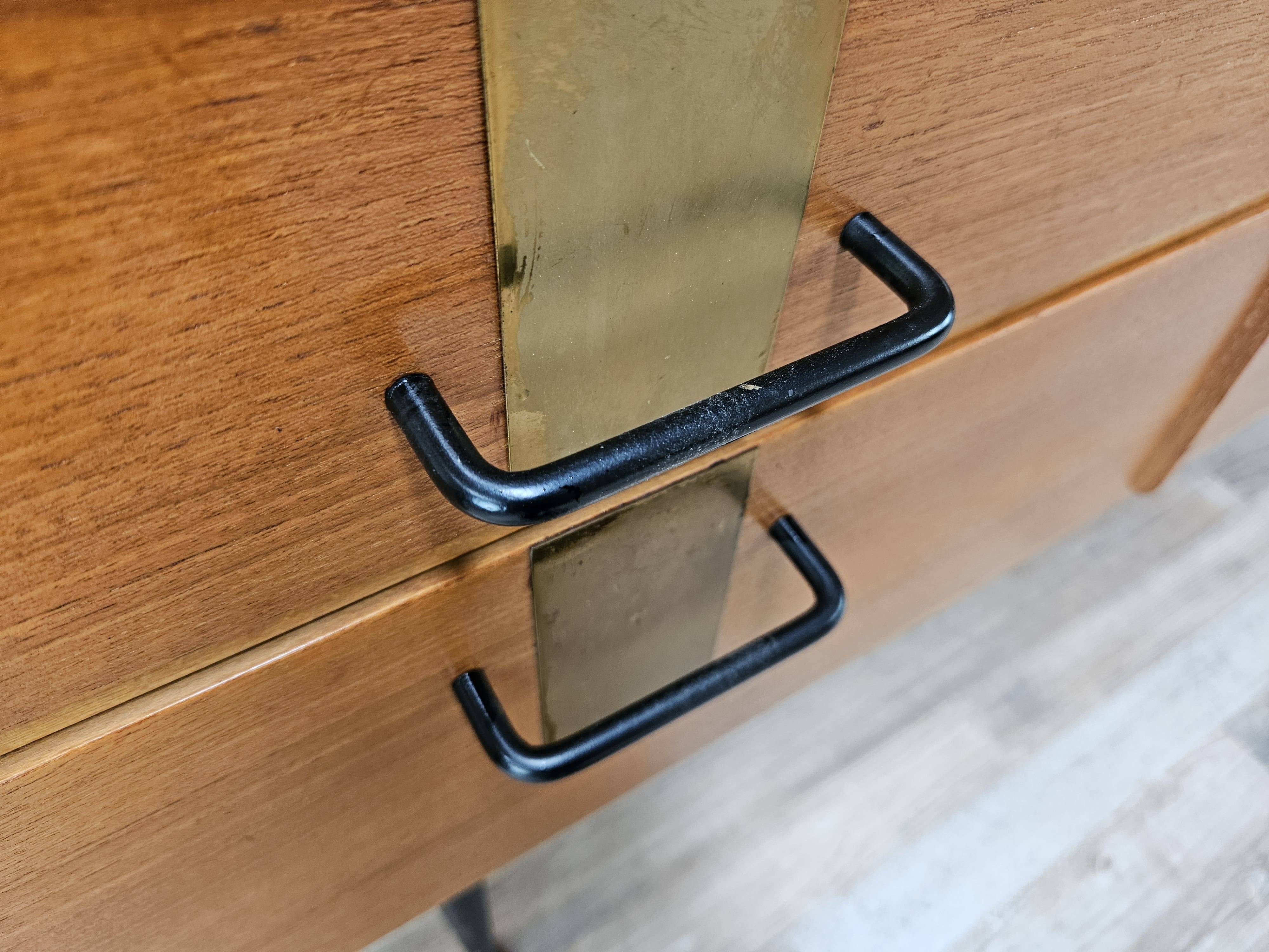 1960s walnut chest of drawers with iron and brass details