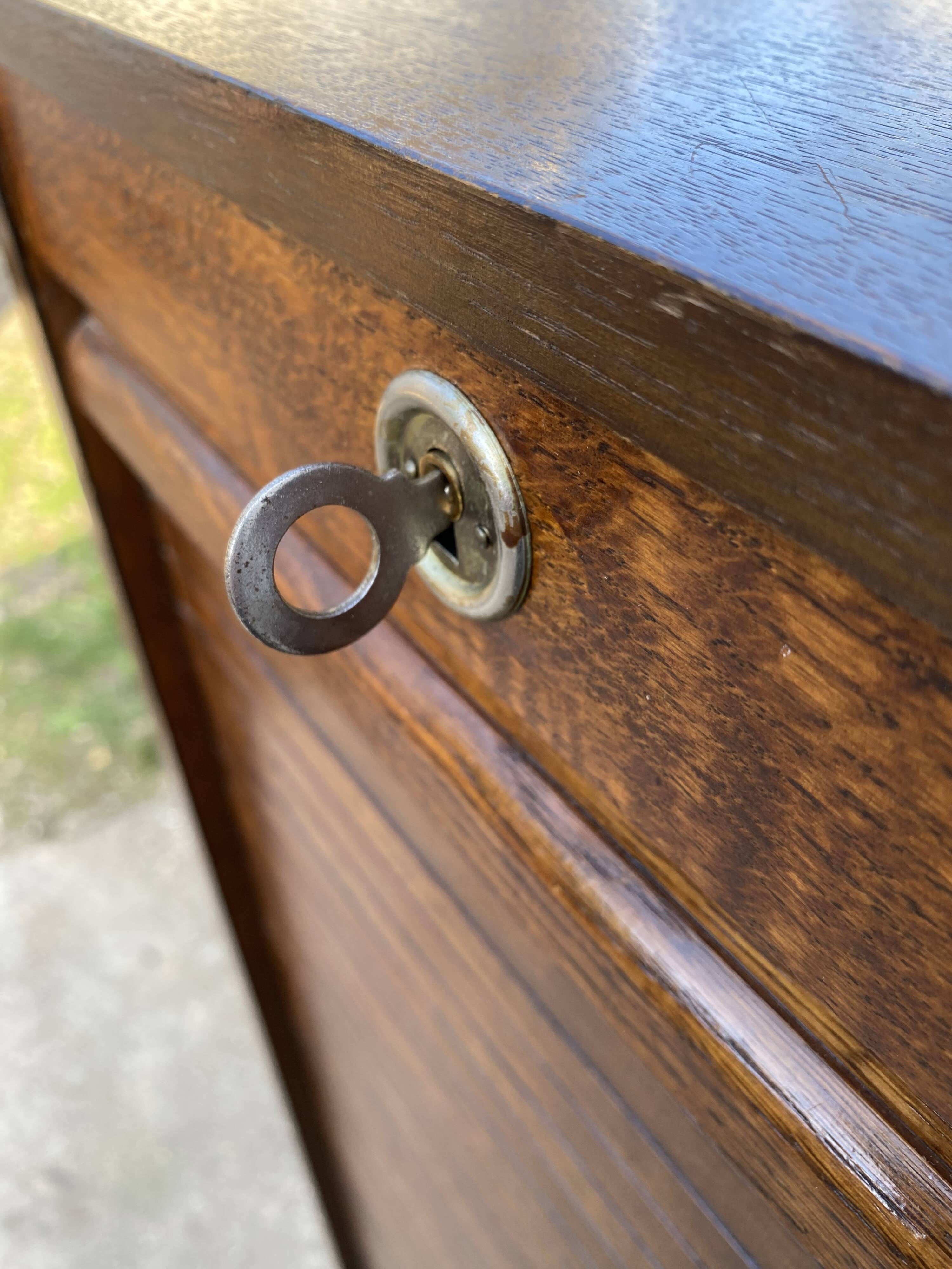 1970 oak office storage cabinet with curtains.
