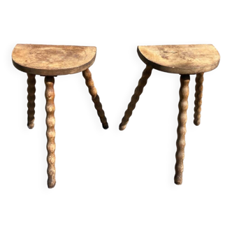 Pair of tripod farm stools in turned wood