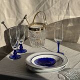 Small golden glass ice bucket with diamond point design and its scoop.