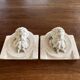Two moulds; plaster heads
