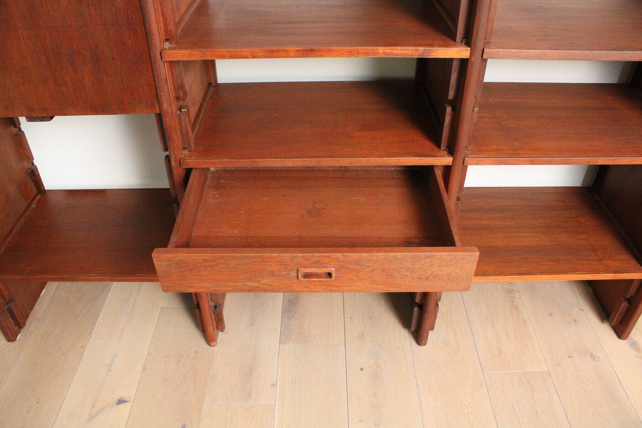 A vintage mid-century teak Gianfranco Frattini style bookcase room divider
