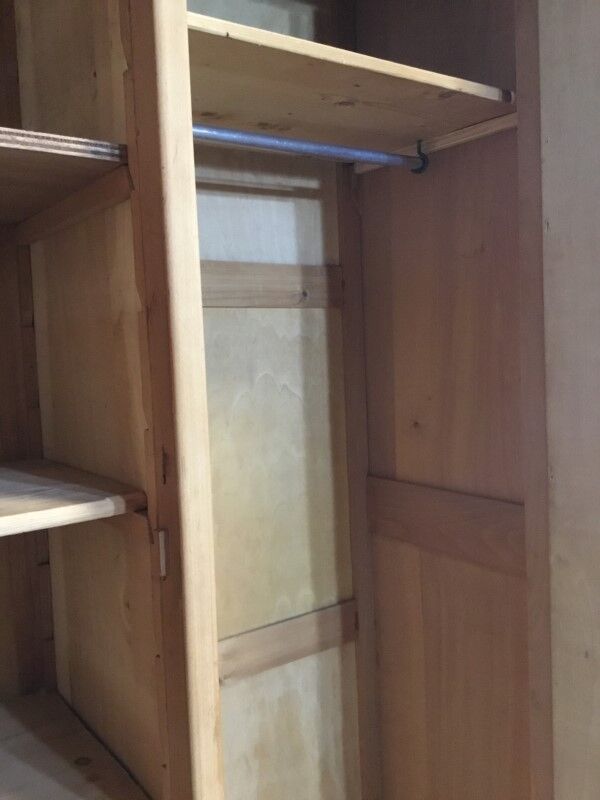 Raw wood hotel cabinet